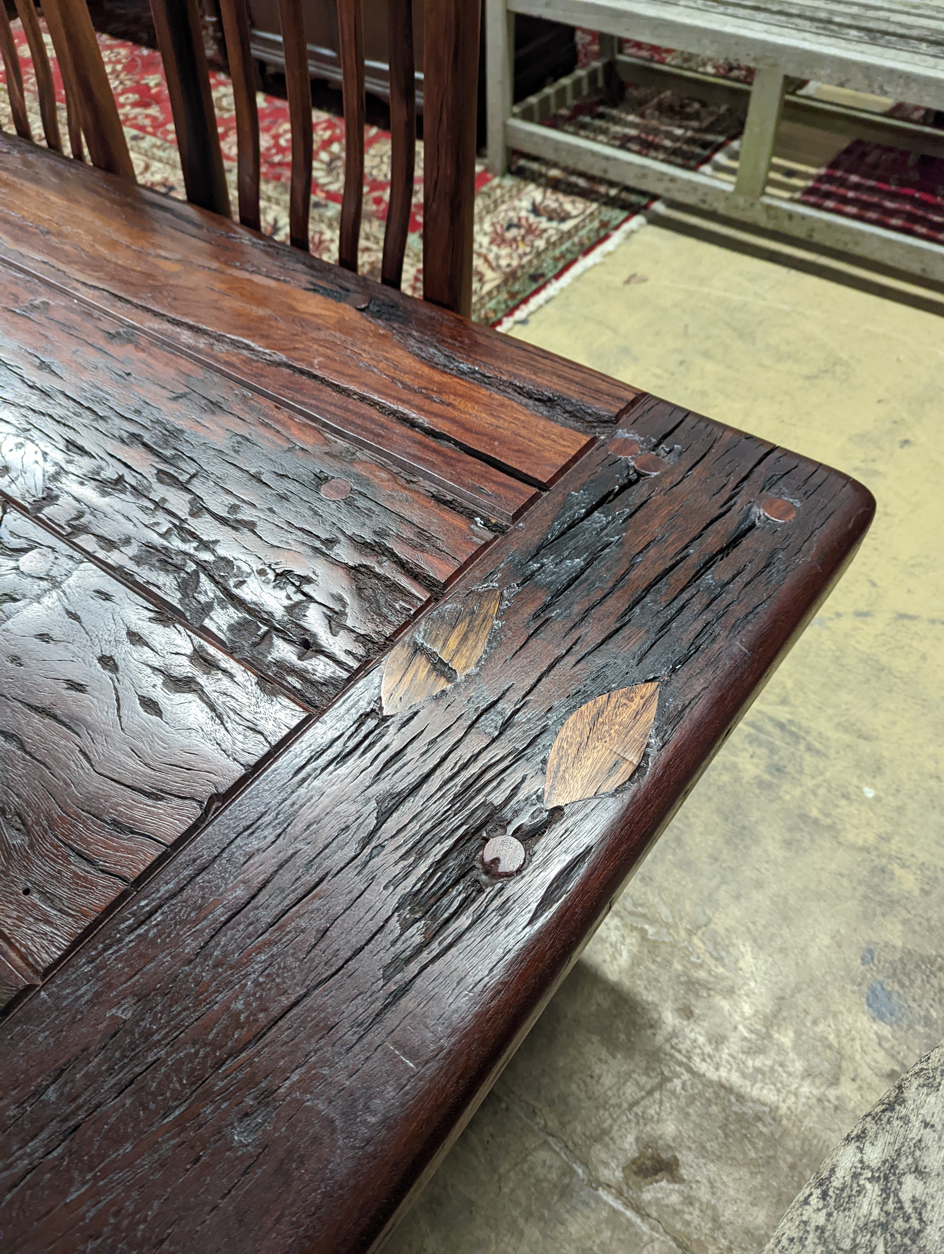 A South African distressed hardwood rectangular refectory dining table, length 200cm, depth 100cm, height 75cm and eight hardwood high back wood seat dining chairs
